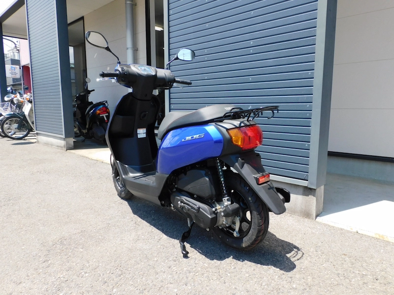 中古車 ヤマハ ジョグ デラックス (JOG DX) ブルー 左うしろ側 2025年6月