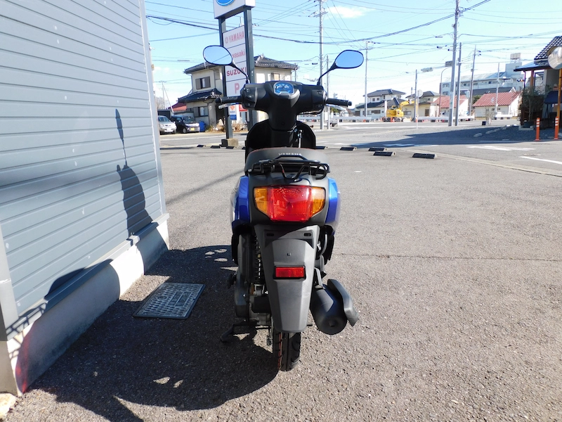 中古車 ヤマハ JOGDX (ジョグデラックス) ブルー うしろ側 2026年1月12日
