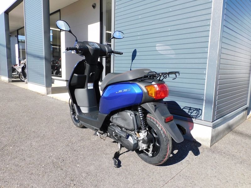 中古車 ヤマハ JOGDX (ジョグデラックス) ブルー 左うしろ側 2026年1月12日